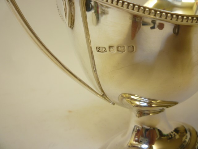 A SILVER PEDESTAL SAUCEBOAT Image