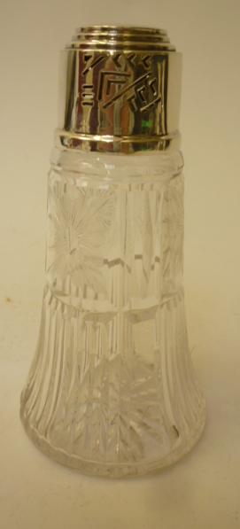 AN ART DECO CUT GLASS AND SILVER SUGAR CASTOR Image