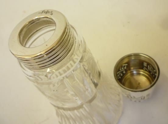 AN ART DECO CUT GLASS AND SILVER SUGAR CASTOR Image