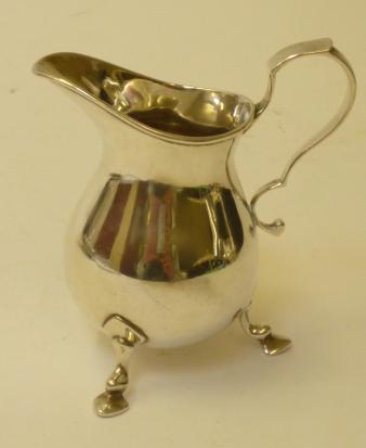 A SILVER CREAM JUG Image