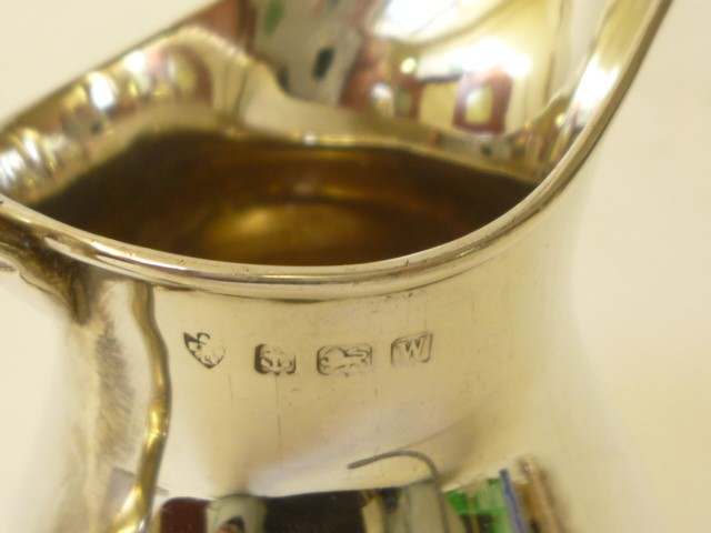 A SILVER CREAM JUG Image