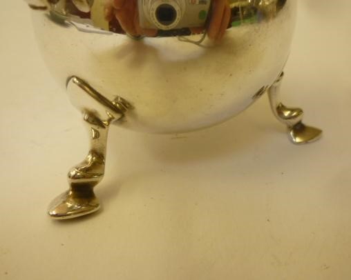 A SILVER CREAM JUG Image