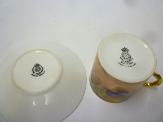 A ROYAL WORCESTER PORCELAIN CABINET CAN AND SAUCER Image