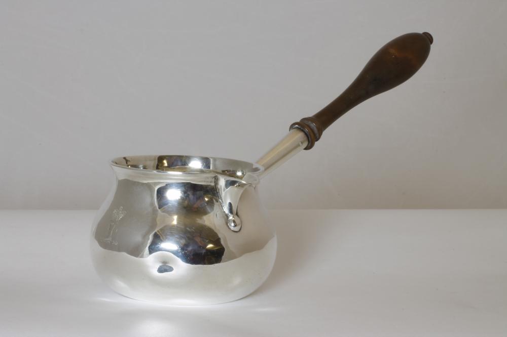 A LATE VICTORIAN SILVER BRANDY SAUCEPAN Image