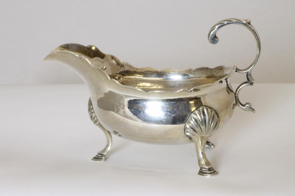 AN EARLY GEORGE III SILVER SAUCEBOAT Image