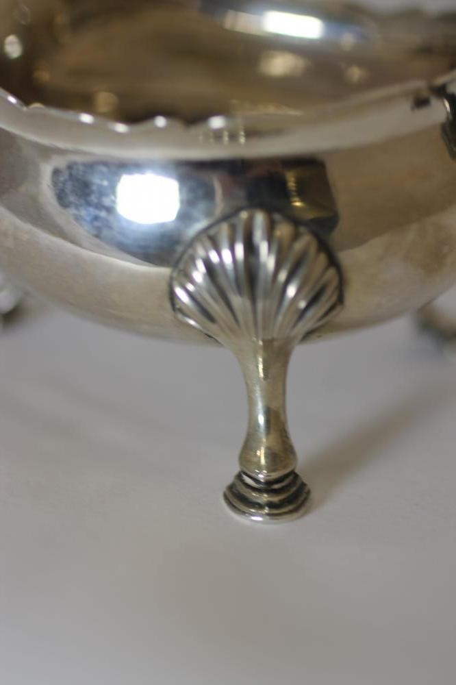 AN EARLY GEORGE III SILVER SAUCEBOAT Image