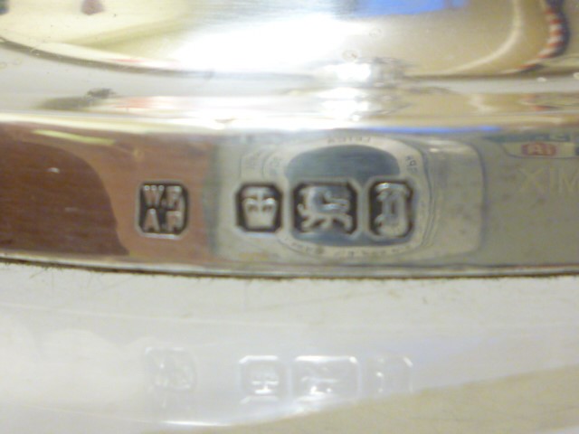 A PAIR OF EDWARDIAN SILVER CANDLESTICKS Image