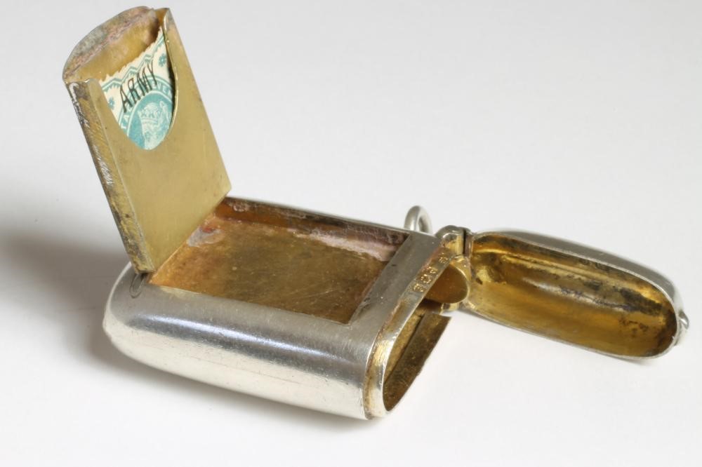 AN EDWARDIAN SILVER NOVELTY VESTA Image