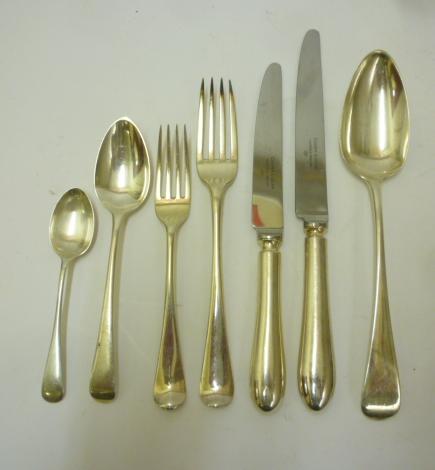 A COMPOSITE GEORGE III AND LATER SILVER TABLE SERVICE in Old English pattern Image