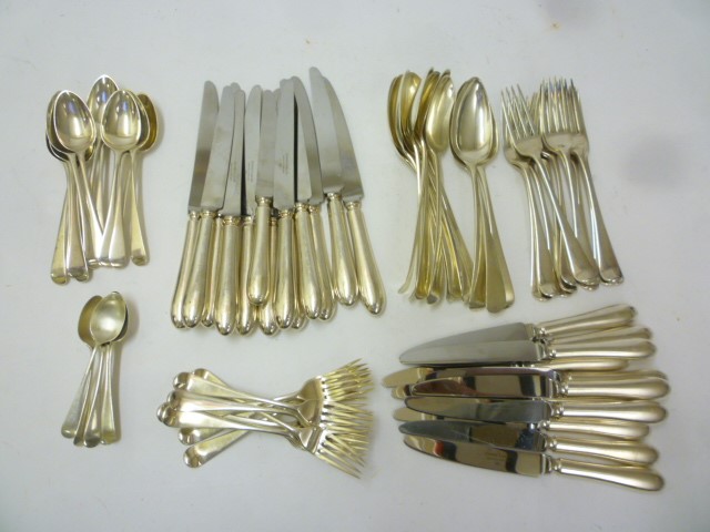 A COMPOSITE GEORGE III AND LATER SILVER TABLE SERVICE in Old English pattern Image