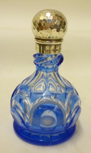 A LATE VICTORIAN CUT AND PANELLED BLUE FLASHED GLASS SCENT BOTTLE Image