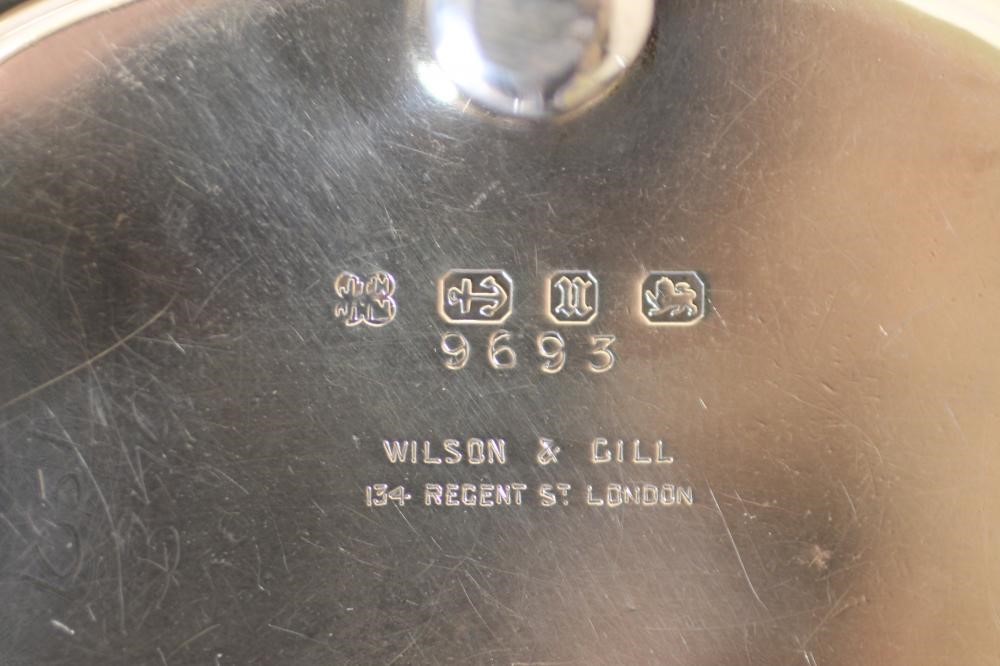 A LATE VICTORIAN NOVELTY SILVER TOASTRACK Image