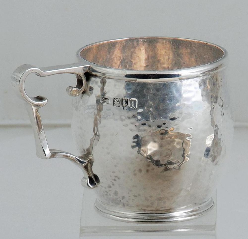 AN ARTS AND CRAFTS SILVER MUG Image