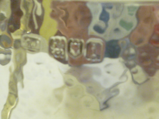 AN ARTS AND CRAFTS SILVER MUG Image