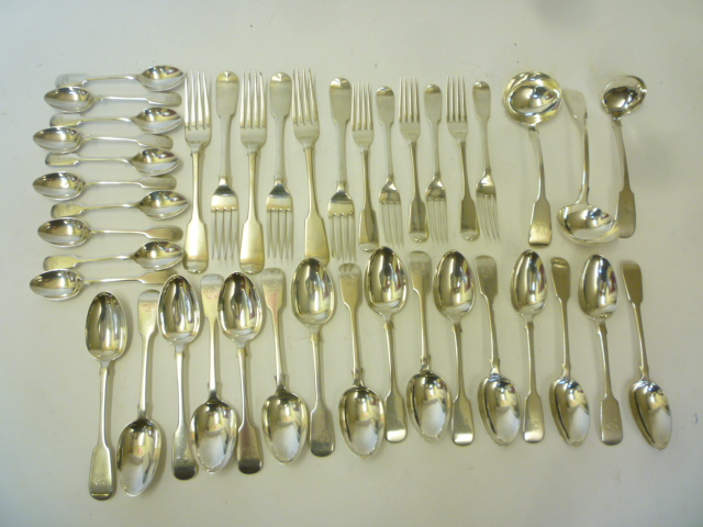 A COMPOSITE SILVER PART TABLE SUITE Image