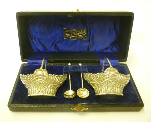 A PAIR OF LATE VICTORIAN SILVER SALT BASKETS Image