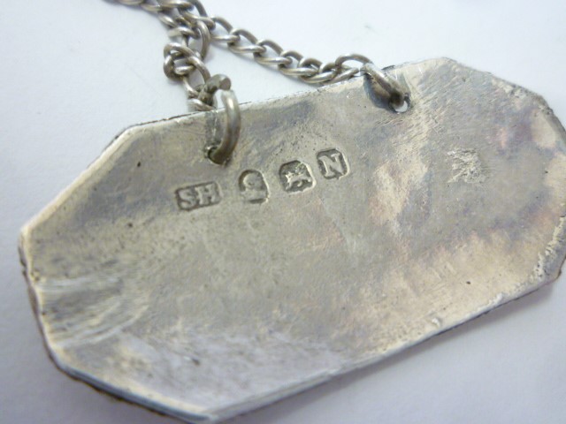 A RARE SET OF SIX GEORGE III SILVER BOTTLE LABELS Image