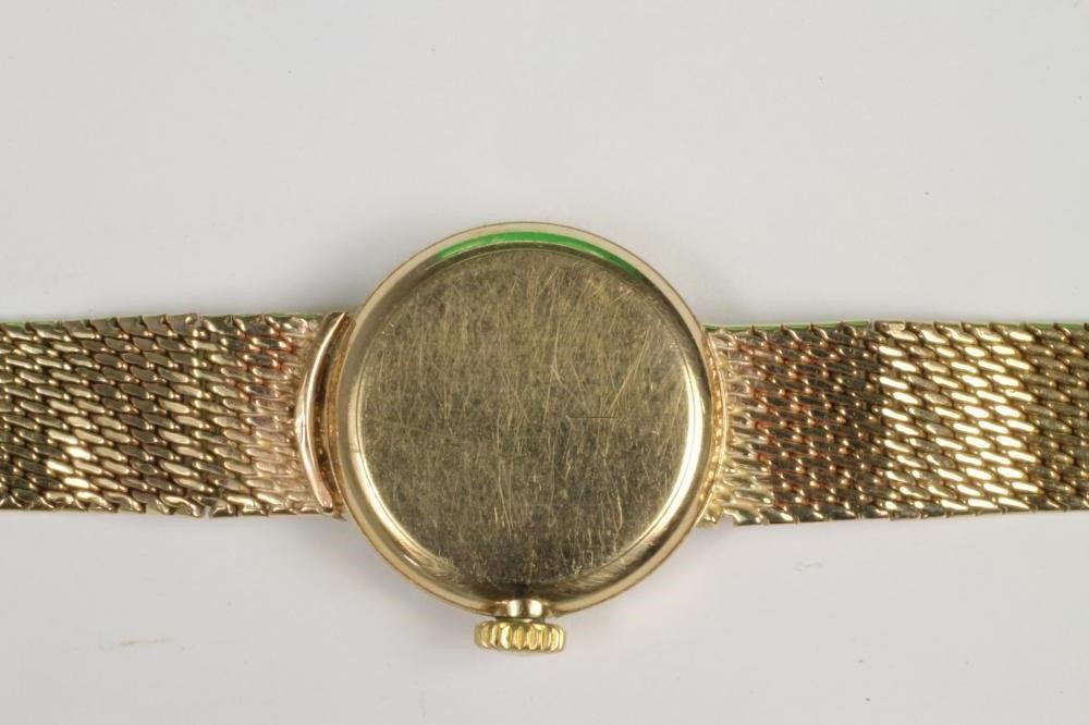 A LADY'S 9CT GOLD OMEGA WRISTWATCH Image