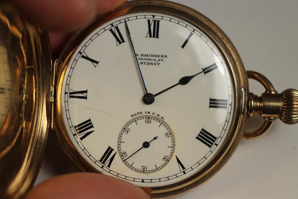 A 9KT GOLD TOP WIND HUNTER POCKET WATCH Image