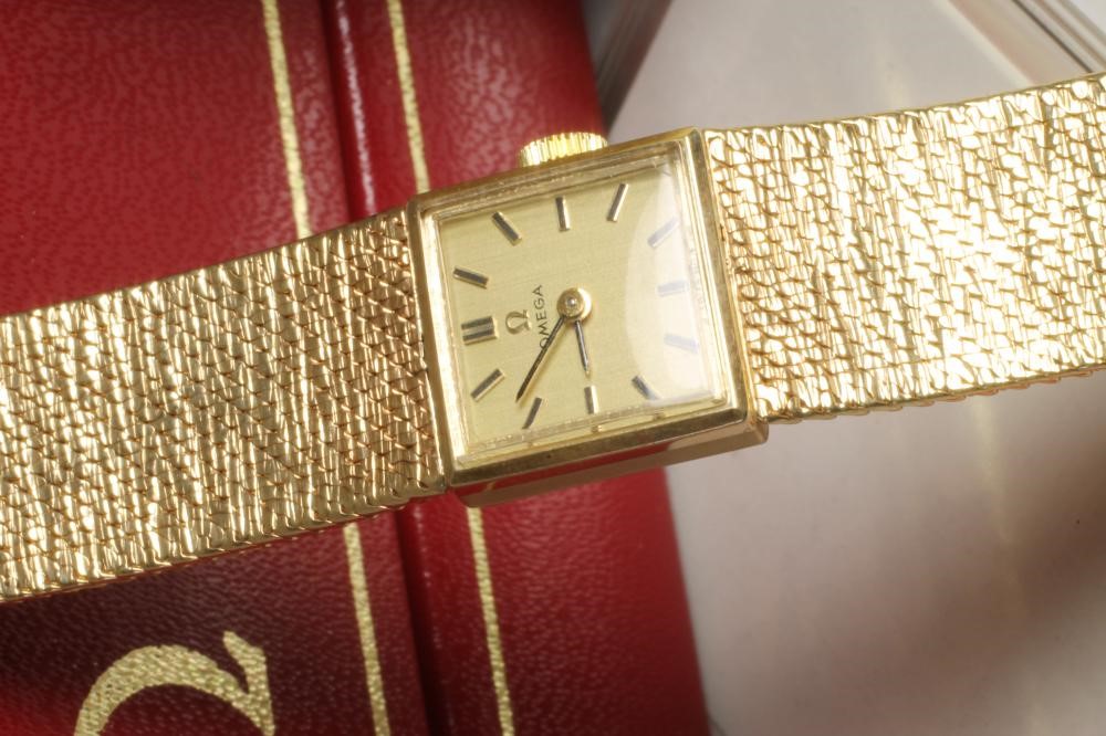 A LADY'S 9CT GOLD "OMEGA" WRISTWATCH Image