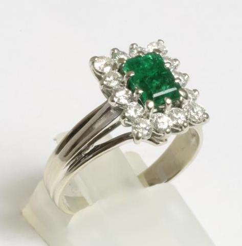 AN EMERALD AND DIAMOND PLAQUE RING Image