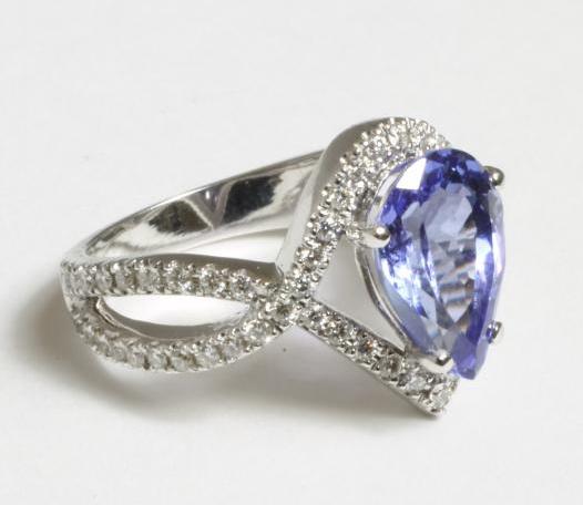 A TANZANITE AND DIAMOND DRESS RING Image