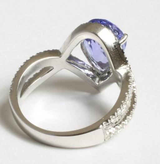 A TANZANITE AND DIAMOND DRESS RING Image