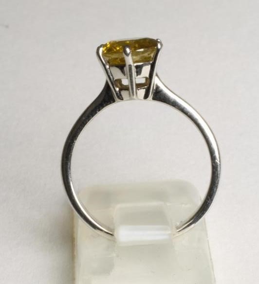 A SOLITAIRE YELLOW DIAMOND RING Image