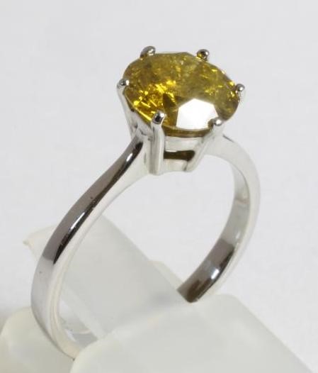 A SOLITAIRE YELLOW DIAMOND RING Image