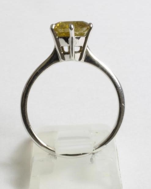 A SOLITAIRE YELLOW DIAMOND RING Image