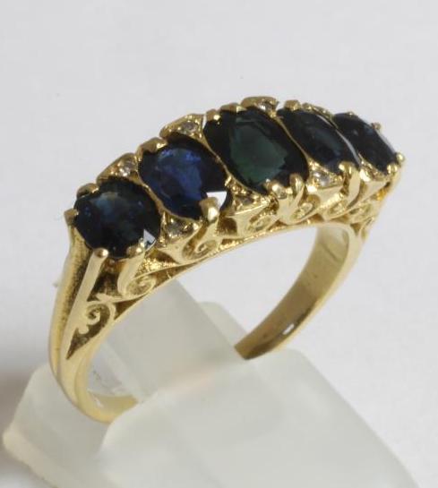 A FIVE STONE SAPPHIRE RING Image