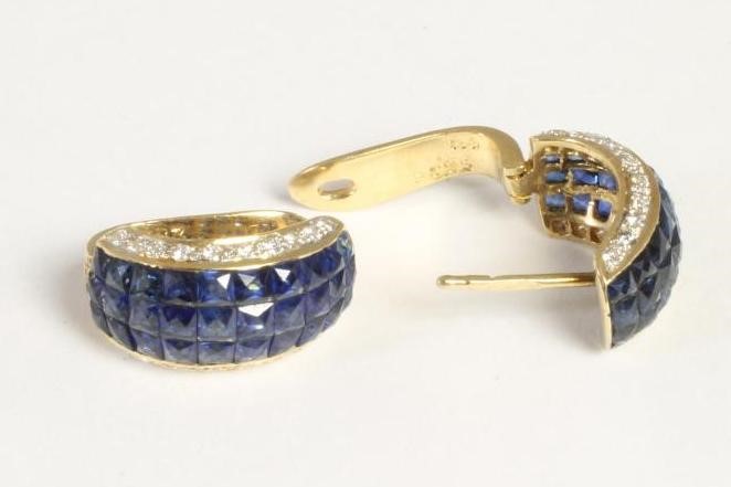 A PAIR OF SAPPHIRE AND DIAMOND HALF HOOP STUD EARRINGS Image