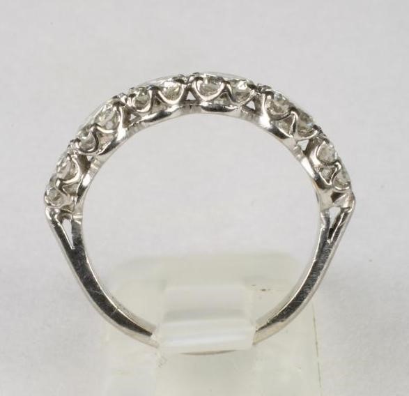 A SIX STONE DIAMOND HALF HOOP RING Image