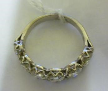 A SIX STONE DIAMOND HALF HOOP RING Image