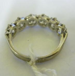 A SIX STONE DIAMOND HALF HOOP RING Image