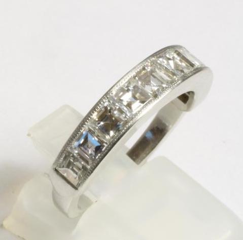 A HALF HOOP DIAMOND RING Image