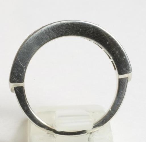 A HALF HOOP DIAMOND RING Image