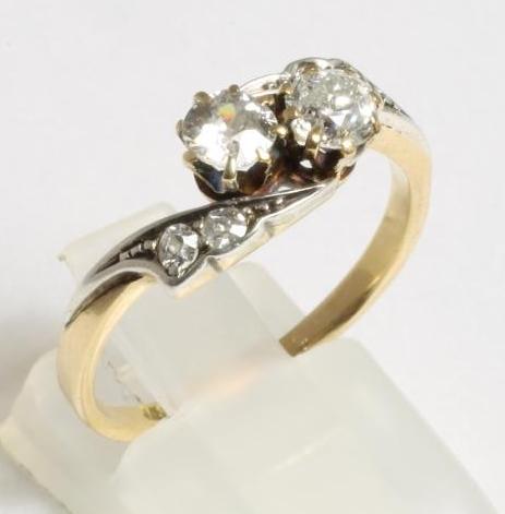 A TWO STONE DIAMOND CROSSOVER RING Image