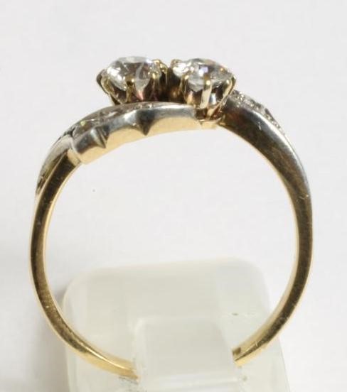 A TWO STONE DIAMOND CROSSOVER RING Image