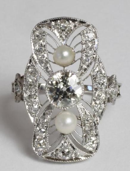 AN ART DECO STYLE DIAMOND AND PEARL PLAQUE RING Image