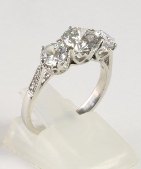 A THREE STONE DIAMOND RING Image