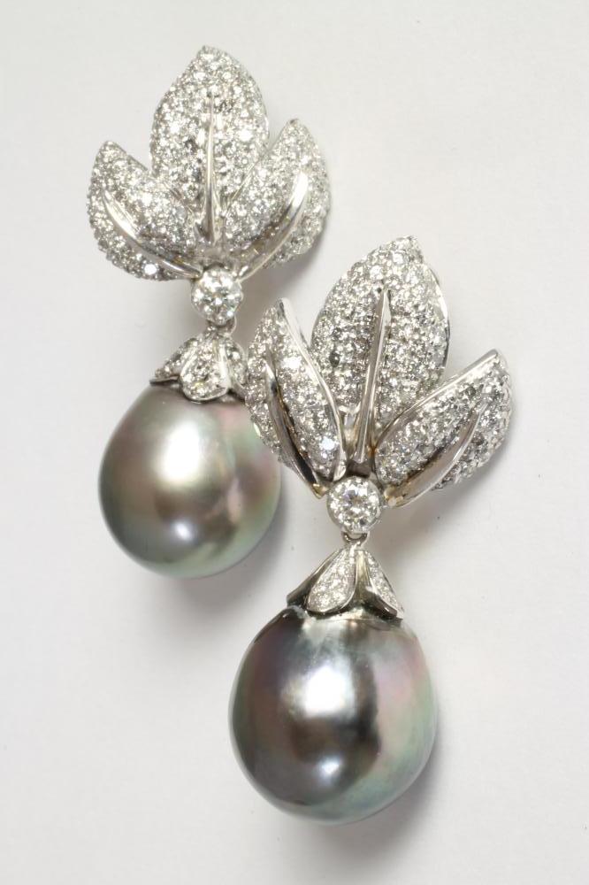 A PAIR OF SOUTH SEA BLACK PEARL AND DIAMOND DROP EAR STUDS Image