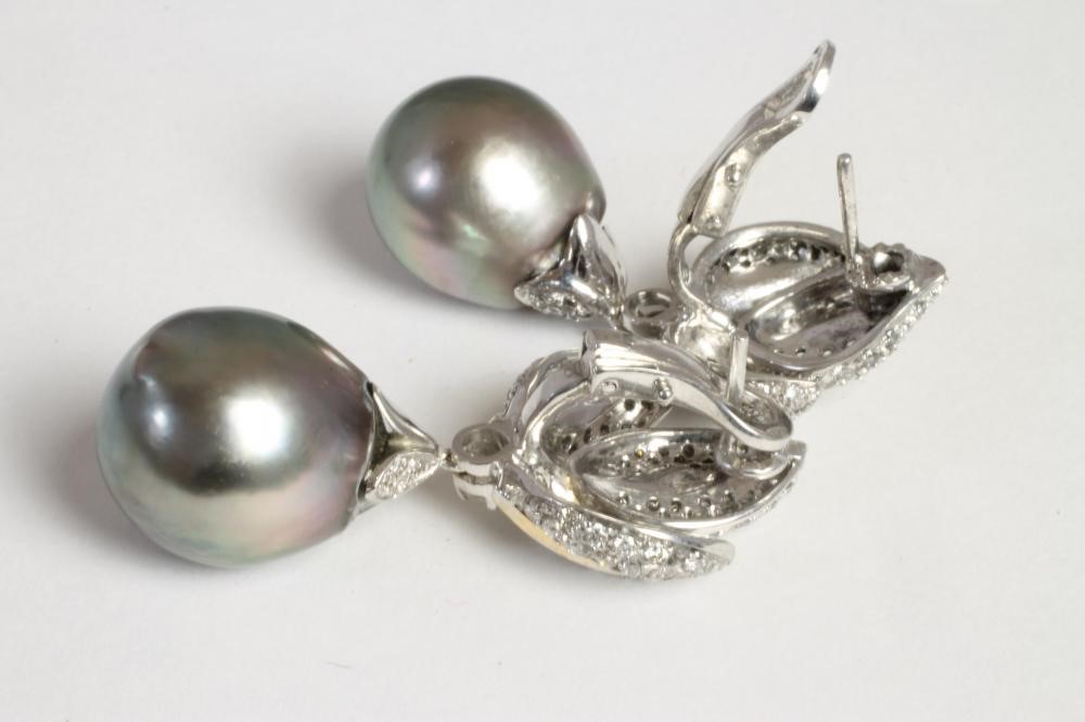 A PAIR OF SOUTH SEA BLACK PEARL AND DIAMOND DROP EAR STUDS Image