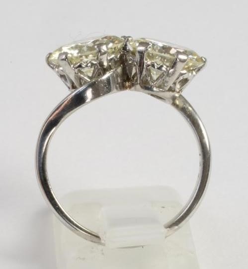 A TWO STONE DIAMOND CROSSOVER RING Image