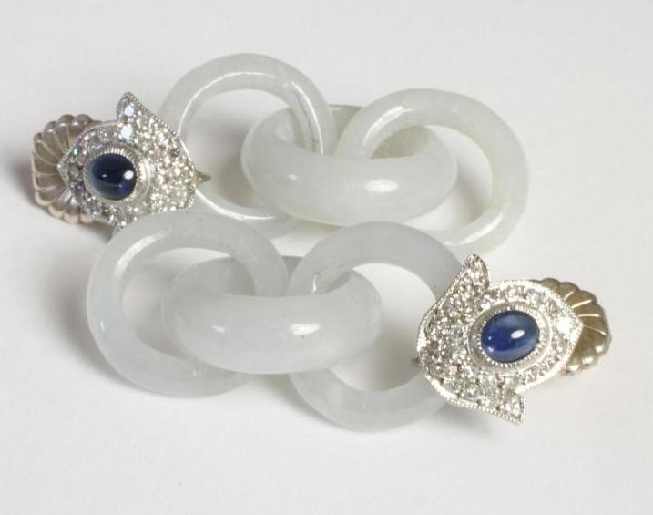 A PAIR OF JADEITE AND DIAMOND STUD DROP EARRINGS Image