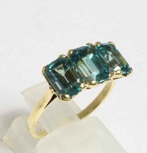 A THREE STONE CUBIC ZIRCONIUM RING Image