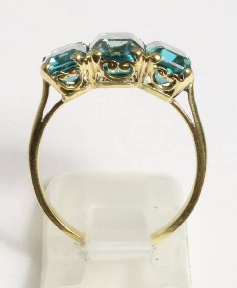 A THREE STONE CUBIC ZIRCONIUM RING Image