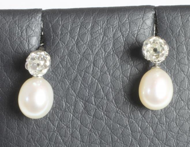 A PAIR OF PEARL AND DIAMOND DROP EARRINGS Image