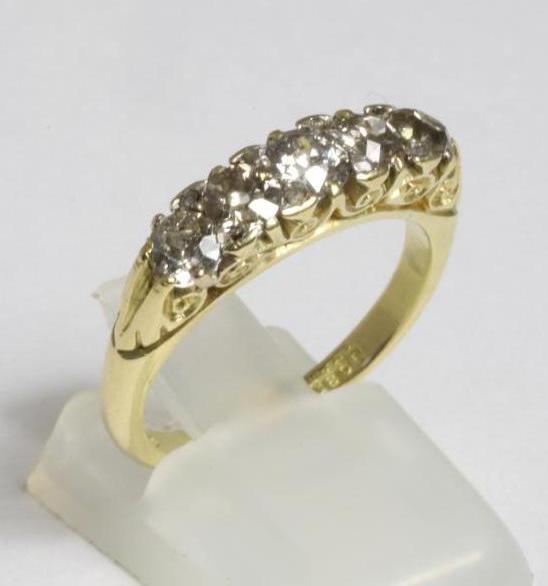 A FIVE STONE DIAMOND RING Image