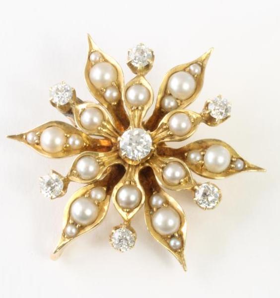 A VICTORIAN PEARL AND DIAMOND SNOWFLAKE BROOCH/PENDANT Image